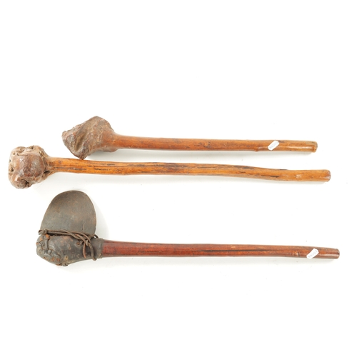 333 - A SELECTION OF THREE AFRICAN CLUBS comprising of two knobkerries and a adze (66cm overall and smalle... 