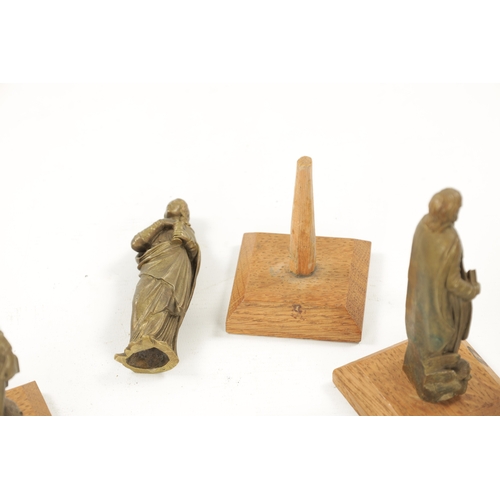 342 - A SET OF FOUR 19TH CENTURY BRONZE APOSTLES mounted on square oak bases - believed to be from Moor ho... 