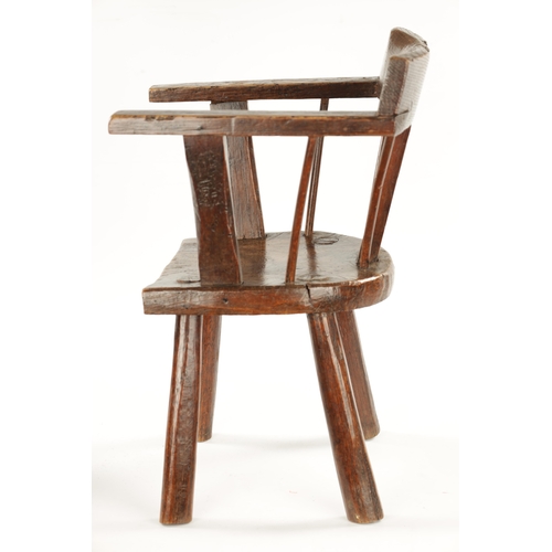 343 - A RARE 18TH CENTURY PRIMITIVE ASH AND ELM CHILD'S CHAIR with bar back and raised arms. (48cm high 29... 