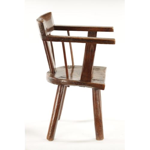 343 - A RARE 18TH CENTURY PRIMITIVE ASH AND ELM CHILD'S CHAIR with bar back and raised arms. (48cm high 29... 