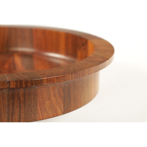 344 - A CIRCULAR CONTEMPORARY SEGMENTED HARDWOOD BOWL BY COCOBOLO, DENMARK bearing stamp beneath. (43cm di... 