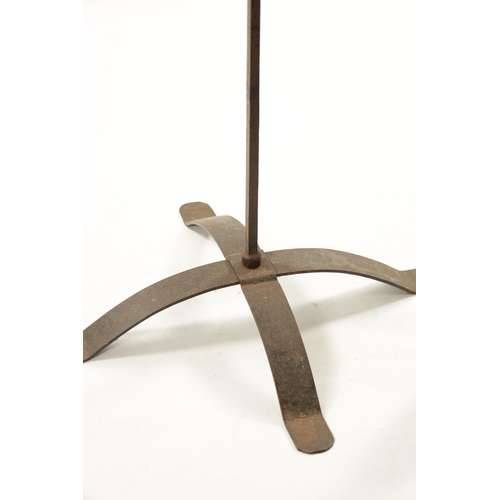 347 - AN 18TH / 19TH CENTURY WROUGHT IRON FLOOR STANDING CANDLESTICK with X framed base (118cm high)