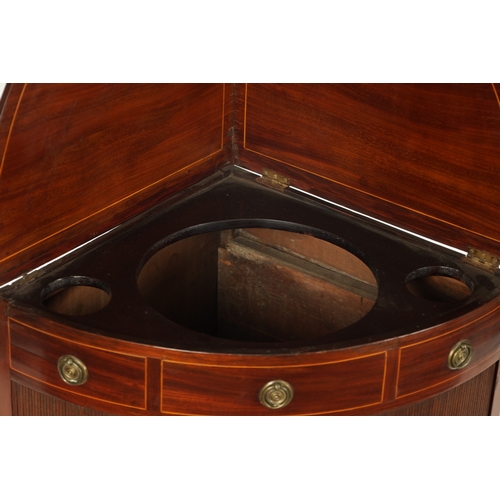 348 - AN UNUSUAL GEORGE III MAHOGANY CORNER WASH STAND with fold down top, fitted with tambour front and s... 