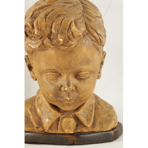 35 - A 20TH CENTURY POTTERY BUST OF ALFRED FRANCES OBE AS A CHILD with photograph (29cm high)