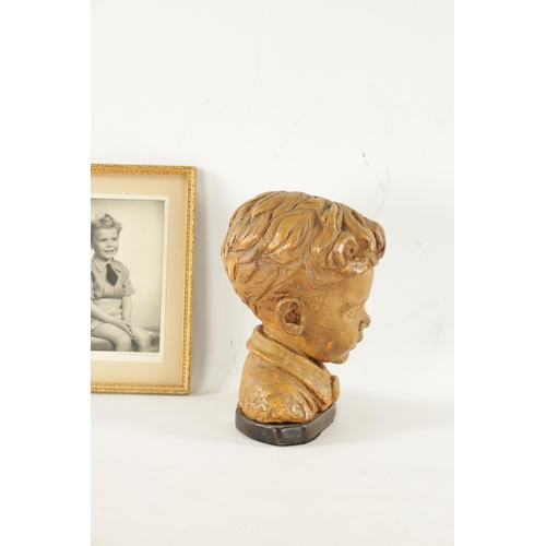 35 - A 20TH CENTURY POTTERY BUST OF ALFRED FRANCES OBE AS A CHILD with photograph (29cm high)