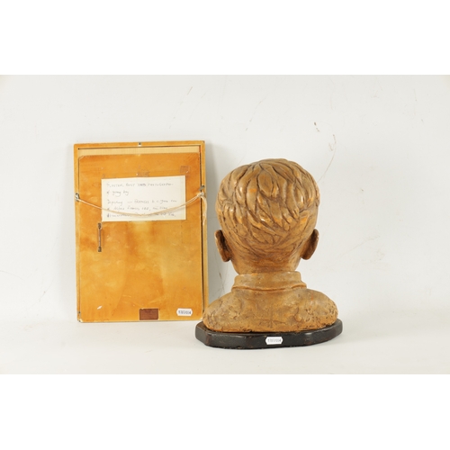 35 - A 20TH CENTURY POTTERY BUST OF ALFRED FRANCES OBE AS A CHILD with photograph (29cm high)