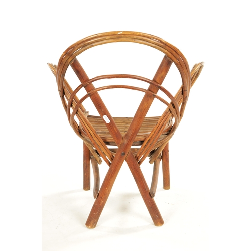 350 - A 19TH CENTURY CANED BENT WOOD CHILD'S CHAIR looped back and sides supported by an x-frame (60cm hig... 