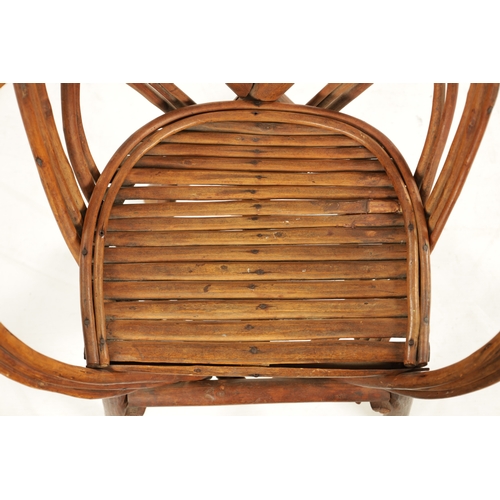 350 - A 19TH CENTURY CANED BENT WOOD CHILD'S CHAIR looped back and sides supported by an x-frame (60cm hig... 