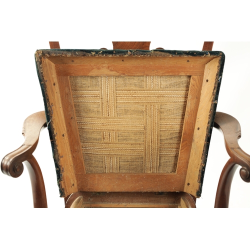 352 - AN 18TH CENTURY FIGURED MAHOGANY COMMODE CHAIR with shaped back splats scrolled arms and short cabri... 