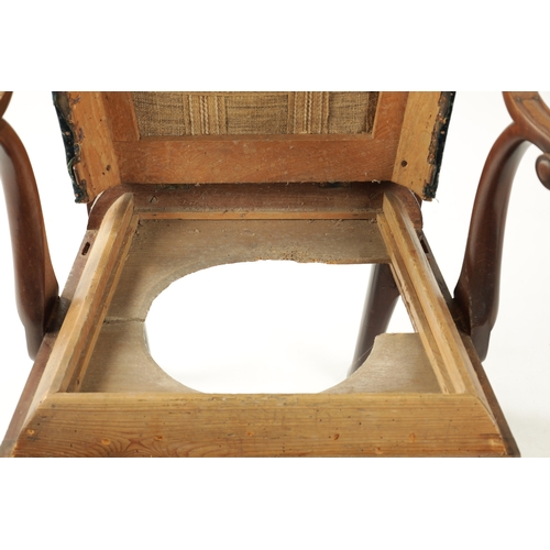 352 - AN 18TH CENTURY FIGURED MAHOGANY COMMODE CHAIR with shaped back splats scrolled arms and short cabri... 