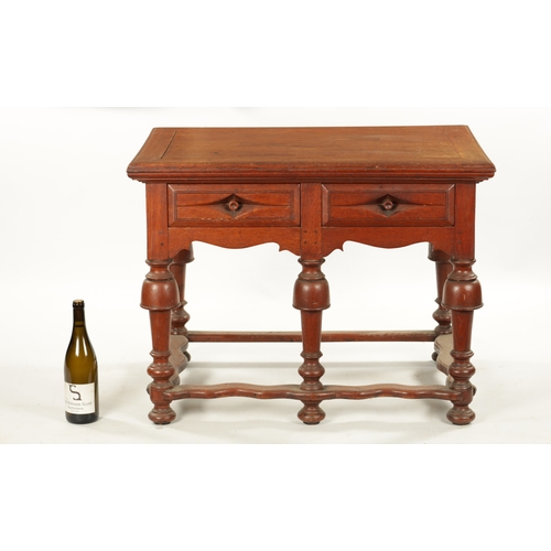 353 - AN UNUSUAL 18TH CENTURY COLONIAL PADOUK WOOD TWO DRAWER TABLE on turned cup and cover legs. (84cm wi... 