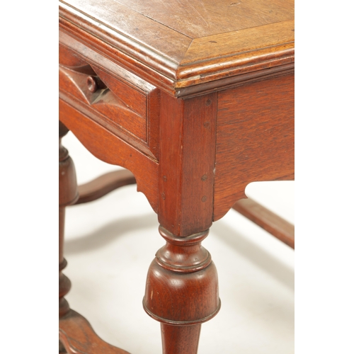 353 - AN UNUSUAL 18TH CENTURY COLONIAL PADOUK WOOD TWO DRAWER TABLE on turned cup and cover legs. (84cm wi... 