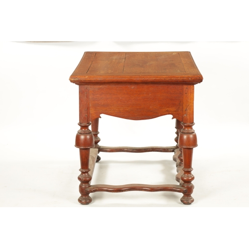 353 - AN UNUSUAL 18TH CENTURY COLONIAL PADOUK WOOD TWO DRAWER TABLE on turned cup and cover legs. (84cm wi... 