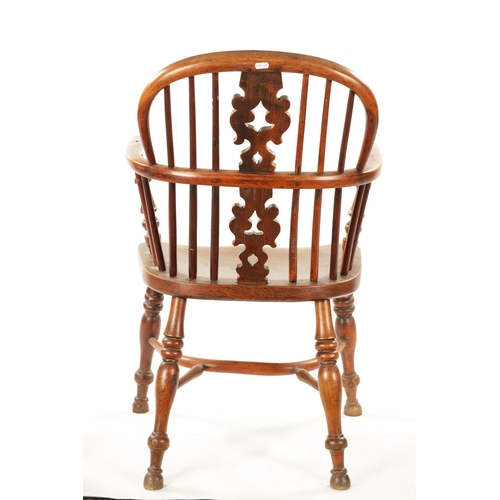 359 - AN EARLY 19TH CENTURY NOTTINGHAMSHIRE YEW-WOOD LOW BACK WINDSOR CHAIR with saddle seat and crinoline... 