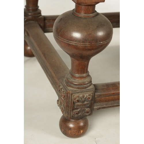 36 - AN 18TH CENTURY FLEMISH OAK TABLE with sliding top above a panelled frieze, ring turned bulbous legs... 