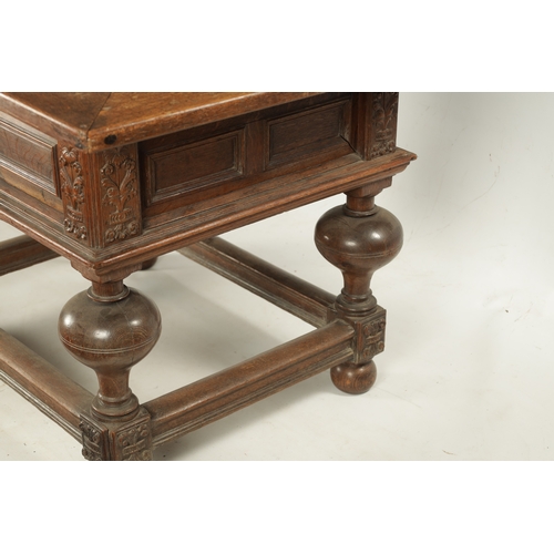 36 - AN 18TH CENTURY FLEMISH OAK TABLE with sliding top above a panelled frieze, ring turned bulbous legs... 