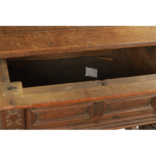 36 - AN 18TH CENTURY FLEMISH OAK TABLE with sliding top above a panelled frieze, ring turned bulbous legs... 