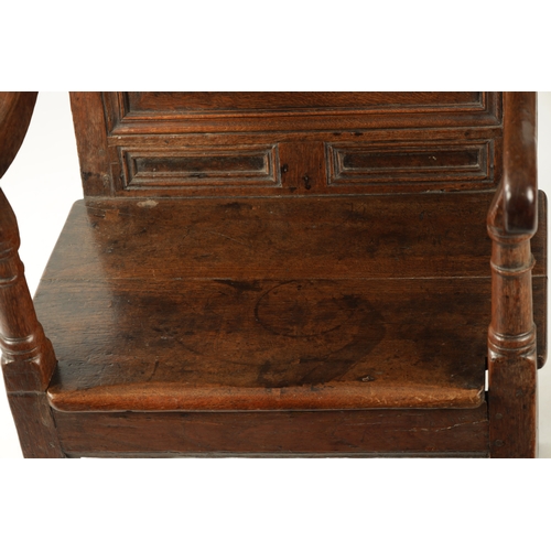 360 - A 17TH CENTURY CARVED OAK JACOBEAN STYLE WAINSCOT CHAIR with grape and floral top rail (56cm wide 11... 