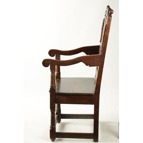 360 - A 17TH CENTURY CARVED OAK JACOBEAN STYLE WAINSCOT CHAIR with grape and floral top rail (56cm wide 11... 