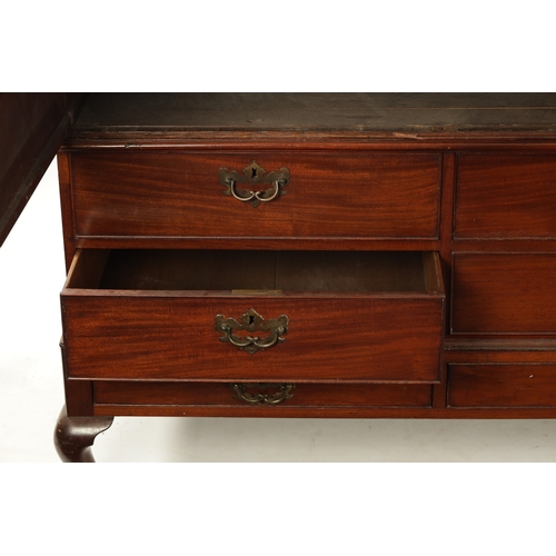 361 - AN UNUSUAL GEORGE II MAHOGANY PRESS CUPBOARD of three sections with pierced cornice above a pair of ... 