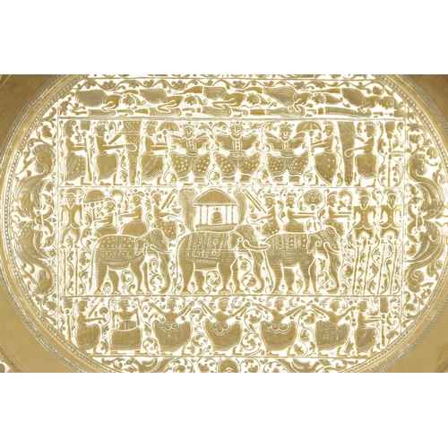 366 - A LATE 19TH CENTURY INDIAN EMBOSSED BRASS OVAL TRAY (61cm wide 52cm deep)