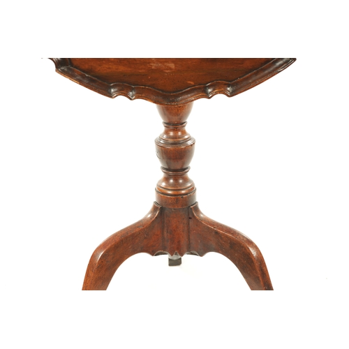 37 - AN 18TH CENTURY COUNTRY MADE MAHOGANY TILT TOP TRIPOD TABLE having a pie crust top with vase shaped ... 