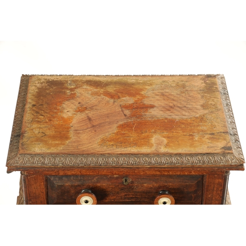 372 - A WILLIAM IV COLONIAL INDIAN PADOUK WOOD WORK TABLE having carved moulded top with frieze drawer; ra... 