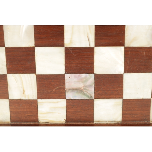 373 - A 19TH CENTURY CHINESE SIMULATED BAMBOO CARVED HARDWOOD AND MOTHER OF PEARL CHEQUERED GAMES BOARD