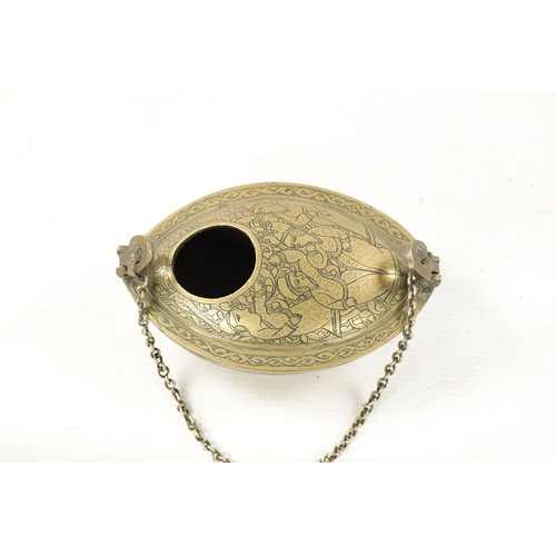 374 - AN ANTIQUE PERSIAN ENGRAVED BRASS HANGING OIL LAMP (14cm wide)