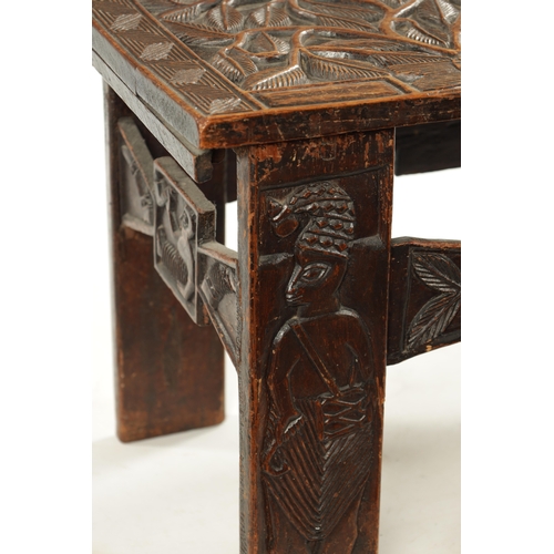 375 - A CARVED HARDWOOD ASHANTI NATIVE OCCASIONAL TABLE (81cm wide 38cm deep 46cm high)