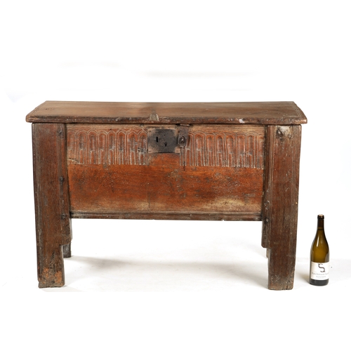 377 - A RARE LATE 16TH CENTURY WELSH OAK BOARDED CHEST with arcaded frieze; raised on thick cut stile feet... 