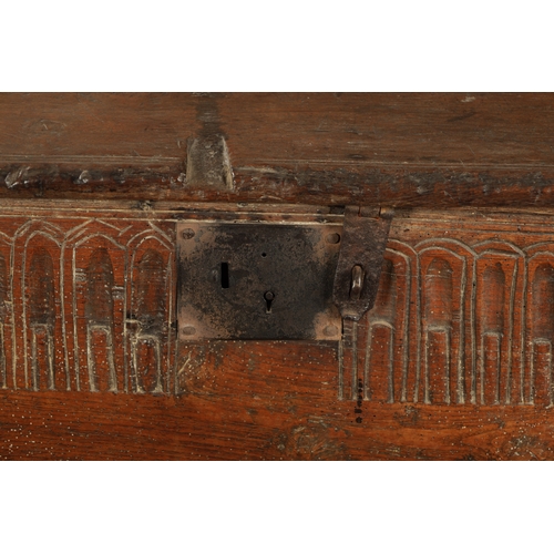 377 - A RARE LATE 16TH CENTURY WELSH OAK BOARDED CHEST with arcaded frieze; raised on thick cut stile feet... 