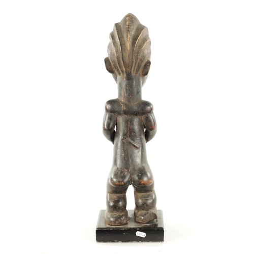 378 - AN ANTIQUE CARVED WOOD BAULE FERTILITY FIGURE with label 'the Eric Mayes Collection' (59cm high)