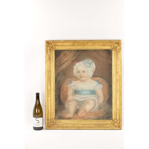 380 - A 19TH CENTURY PASTEL OF A SEATED CHILD WITH BONNET having gilt moulded glazed frame. (56cm high 36c... 