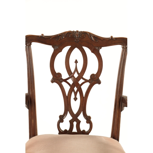 381 - AN 18TH CENTURY CARVED MAHOGANY CHIPPENDALE STYLE OPEN ARMCHAIR with peirced back and upholstered se... 