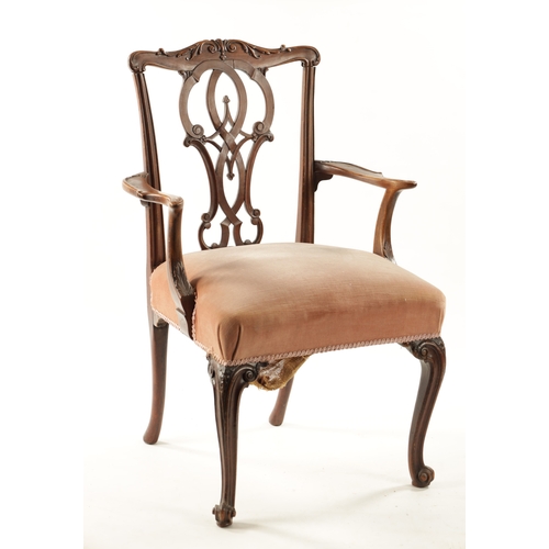 381 - AN 18TH CENTURY CARVED MAHOGANY CHIPPENDALE STYLE OPEN ARMCHAIR with peirced back and upholstered se... 