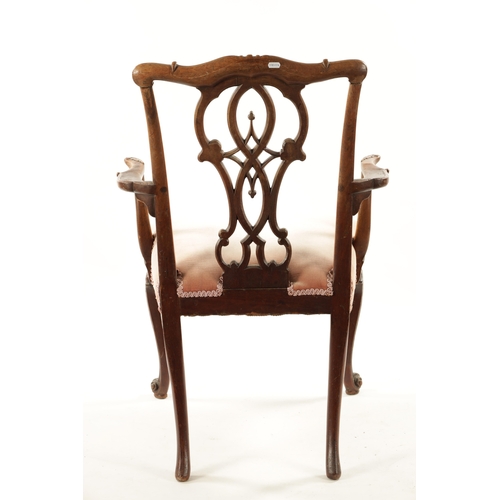 381 - AN 18TH CENTURY CARVED MAHOGANY CHIPPENDALE STYLE OPEN ARMCHAIR with peirced back and upholstered se... 