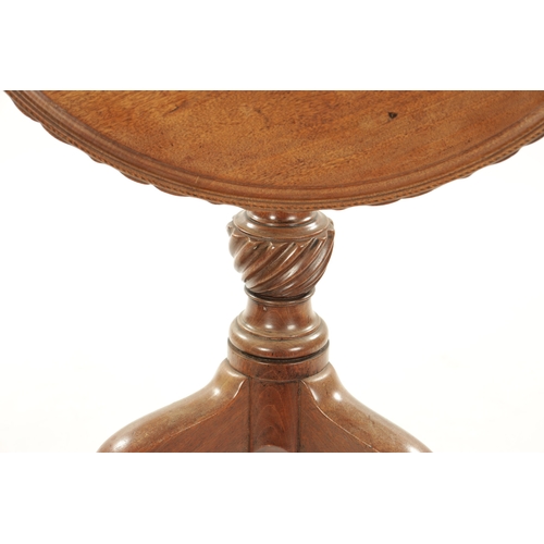 385 - A FINE 18TH CENTURY CIRCULAR WAVY EDGED MAHOGANY TILT-TOP TRIPOD TABLE with inlaid strung edge top a... 