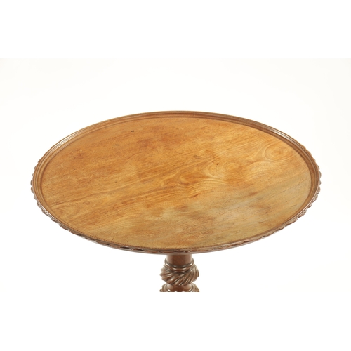 385 - A FINE 18TH CENTURY CIRCULAR WAVY EDGED MAHOGANY TILT-TOP TRIPOD TABLE with inlaid strung edge top a... 