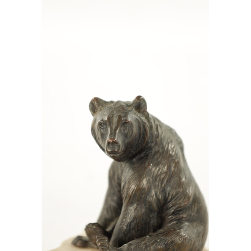 389 - A 19TH CENTURY FILLED BRONZE BEAR ON MARBLE BASE POSSIBLY RUSSIAN (12cm high)