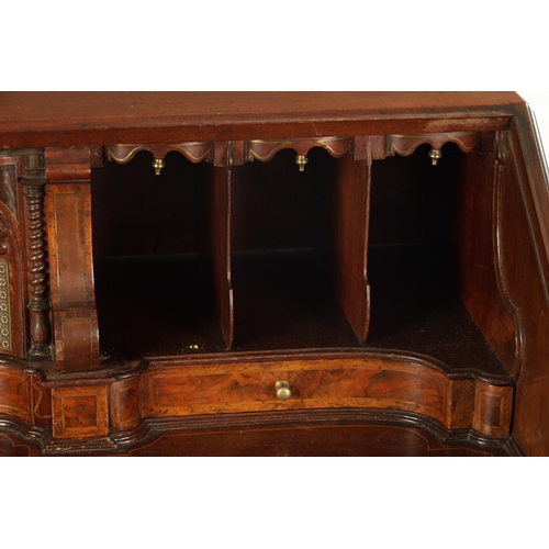 392 - AN IMPORTANT FINE GEORGE II BRASS INLAID FIGURED MAHOGANY BUREAU ATTRIBUTED TO JOHN CHANNON the angl... 