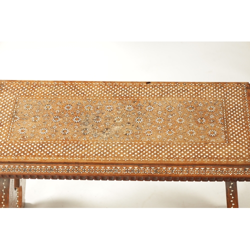 394 - A 19TH CENTURY INDIAN INLAID BONE AND HARWOOD SIDE TABLE of Mourish design with shaped end supports ... 