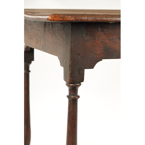 395 - AN EARLY 18TH CENTURY OAK AND ELM RECTANGULAR TABLE with overhanging top and ring turned supports. (... 