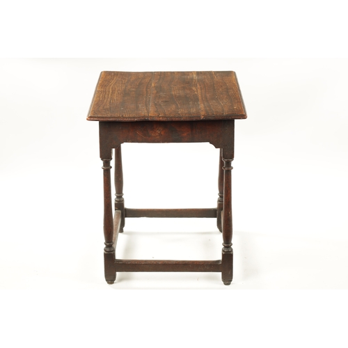 395 - AN EARLY 18TH CENTURY OAK AND ELM RECTANGULAR TABLE with overhanging top and ring turned supports. (... 