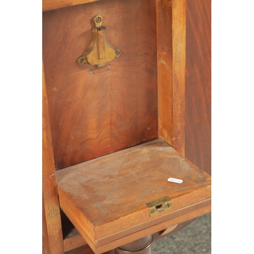 402 - A REGENCY FIGURED MAHOGANY SUPPER TABLE with tilt top; raised on fluted supports (69cm wide 57cm dee... 