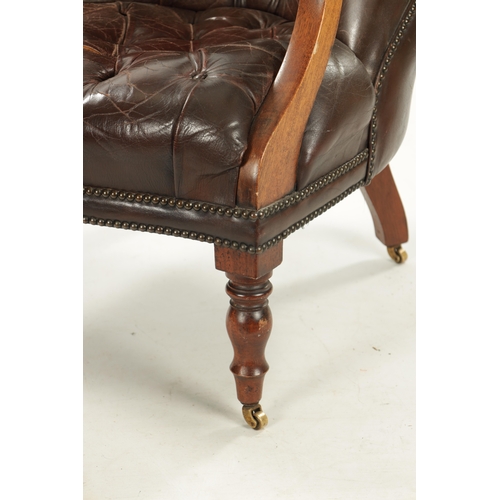 403 - A WILLIAM IV LEATHER BUTTON BACK LEATHER UPHOLSTERED MAHOGANY LIBRARY CHIAR raised on turned legs (5... 