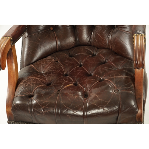 403 - A WILLIAM IV LEATHER BUTTON BACK LEATHER UPHOLSTERED MAHOGANY LIBRARY CHIAR raised on turned legs (5... 