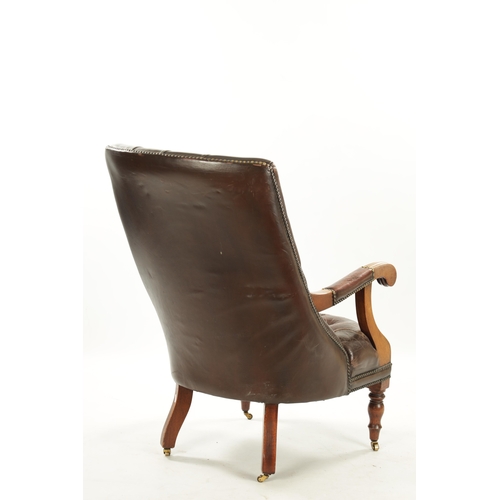 403 - A WILLIAM IV LEATHER BUTTON BACK LEATHER UPHOLSTERED MAHOGANY LIBRARY CHIAR raised on turned legs (5... 