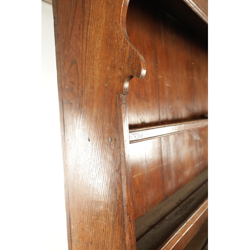 407 - A LATE 18TH CENTURY WELSH OAK DRESSER AND RACK with breakfront base having fitted drawers and side c... 