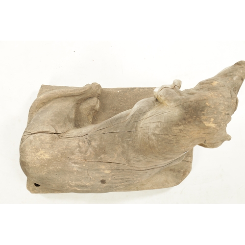 413 - A 19TH CENTURY CARVED WOOD SCULPTURE OF A SEATED DOG inscribed on base 'Henri' (73cm wide 45cm deep ... 